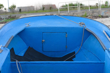 wooden fishing boat dries ashore