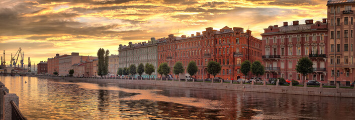 Panorama of the Fontanka river embankment in St. Petersburg at sunset
