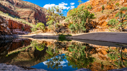 Fototapeta na wymiar Scenic view of Ormiston gorge water hole in the West MacDonnell Ranges outback Australia