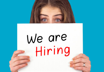 woman holding empty poster