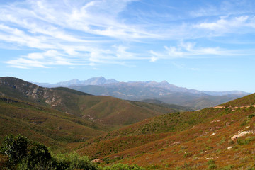 Fototapeta na wymiar Interior of Corsica viewed from the Desert des Agriates in the North of the island