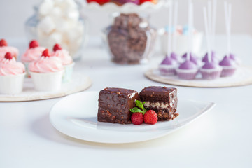 chocolate cake with strawberries on a white background