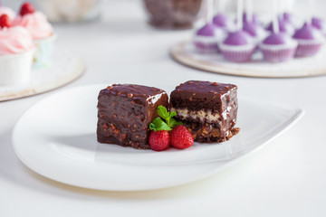 chocolate cake with strawberries on a white background
