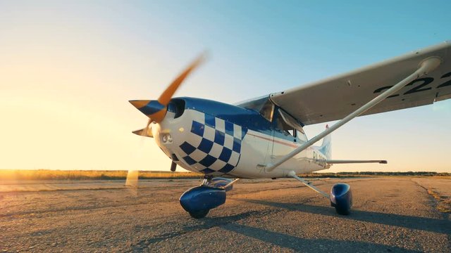 Working plane going on an airfield, close up.