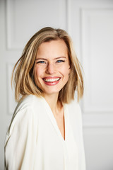 Stunning young woman smiling to camera