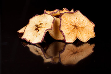 bright, crispy, crisp snack of ripe and sweet apple on a black background