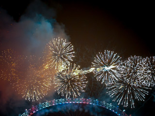 The London New year fireworks display captured from the central Barge on the River Thames