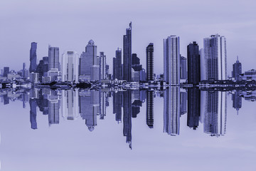 Business and Technology concept - monotone light blue panoramic modern cityscape building with...
