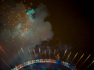 The London New year fireworks display captured from the central Barge on the River Thames