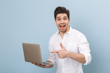 Portrait of a cheerful handsome young man