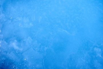 Texture blue cosmic ice with a matte effect on a lake in the