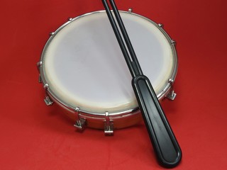 Tamborim and drumstick: a Brazilian percussion musical instrument. It is used to play samba, the...