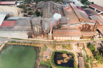 Industry factory manufacturing with emission smoke from chimneys
