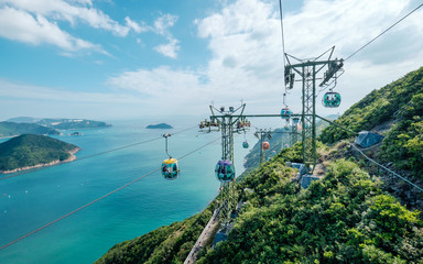 Cable car along the sea - Powered by Adobe