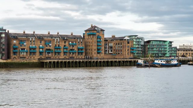 Day time apartment blocks of Tower Bridge Wharf, Thames Path, Wapping, London, UK.