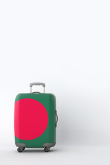 Travel suitcase with the flag of Bamgladesh. Holiday destination. 3D Render