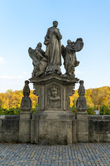 Fototapeta na wymiar Statue with a religious story on a pedestrian street (terrace) Barborska.