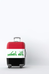 Travel suitcase with the flag of Iraq. Holiday destination. 3D Render