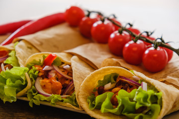 Mexican burrito with chicken, pepper and beans