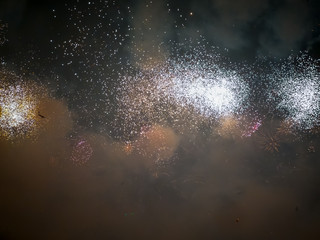 The London New year fireworks display captured from the central Barge on the River Thames