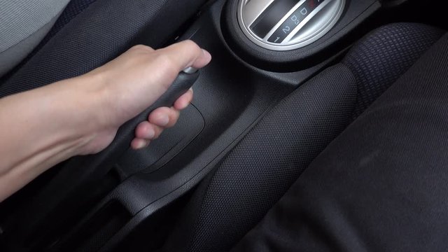 4K Pull the handbrake while parking. And brake the hand before moving the car out