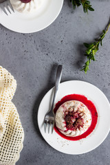 Cottage cheese dessert (jelly or panna cotta) with cherry sauce and cocoa. Healthy breakfast or dessert.  