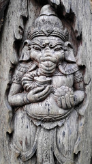 Fototapeta na wymiar Old elephant shape wood sculpture in Bali