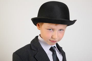 hat, boy, smile, school clothes, portrait, boy, child, schoolboy with a phone, artist, actor, boy actor, young model, portrait boy, school suit, school uniform, tie, conversation, blond, posing