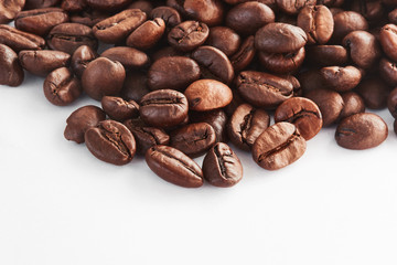 roasted coffee beans on white table