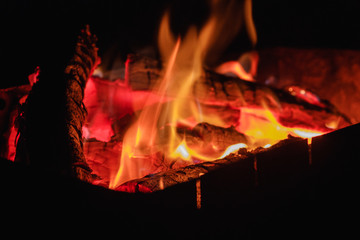 Hot coals fire with smoke. Texture on a picnic outdoor