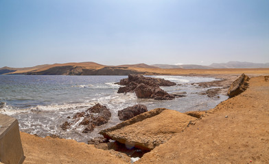 Fototapeta na wymiar Panoramic view of Lagunillas Beach in the National Reserve of Paracas Park, Peru