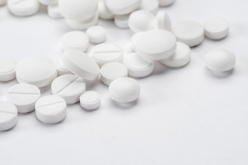 white pills and tablets capsule isolated on white background