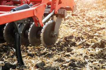Agricultural plow close-up on the ground