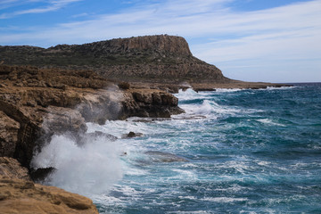 waves crashing on rocks