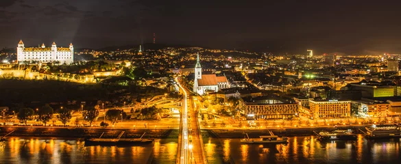 Foto op Plexiglas Beautiful panorama of  Bratislava Downtown.View of night town.Cityscape at twilight.Traveling concept background.The landscape of the old historical city.Architecture,  buildings Slovakia,Europe © mykola