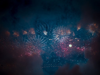 The London New year fireworks display captured from the central Barge on the River Thames