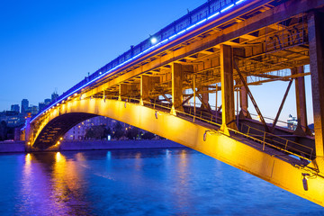 Night urban landscape with old Smolensky Metro Bridge in Moscow