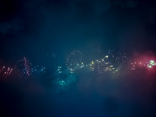 The London New year fireworks display captured from the central Barge on the River Thames