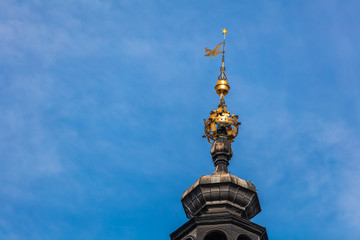 Fototapeta na wymiar closeup of Town Hall Tower in Krakow, Poland