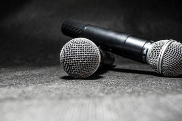 Kiev, Ukraine. January 10, 2019. The microphone for singing on black background lies. Karaoke....