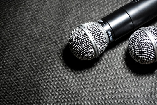 Kiev, Ukraine. January 10, 2019. The microphone for singing on black background lies. Karaoke. Modern technologies. Music. Gadgets