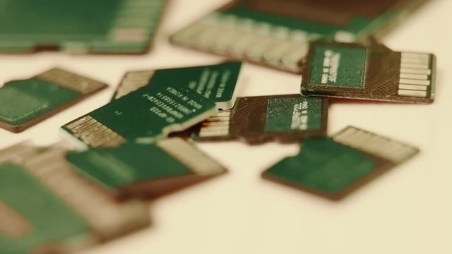 Group of cards over a wooden table. Macro and tracking shot. Teal and orange style