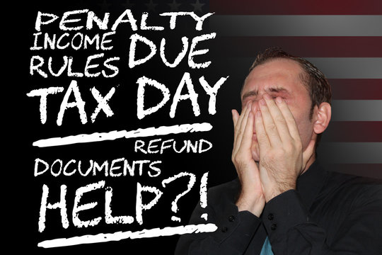 businessman stressed face expresion, having troble with tax form