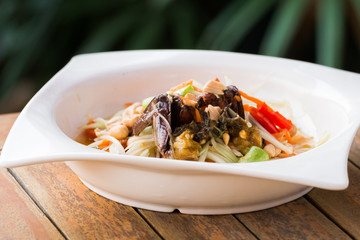 thai style spicy papaya salad, favourite dish of thai local food.