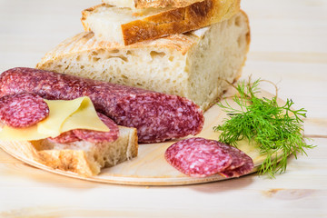Sandwiches with salami and cheese