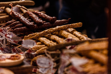 Handmade Iberian pork sausages for sale at a medieval fair.