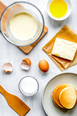 cooking pancake on white background top view ingredients for making