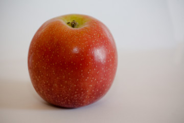 Isolated apple fruit on white background side view