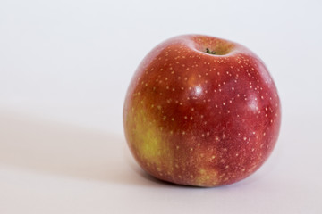 Isolated apple fruit on white background side view