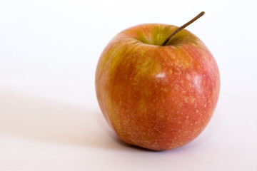 Isolated apple fruit on white background side view